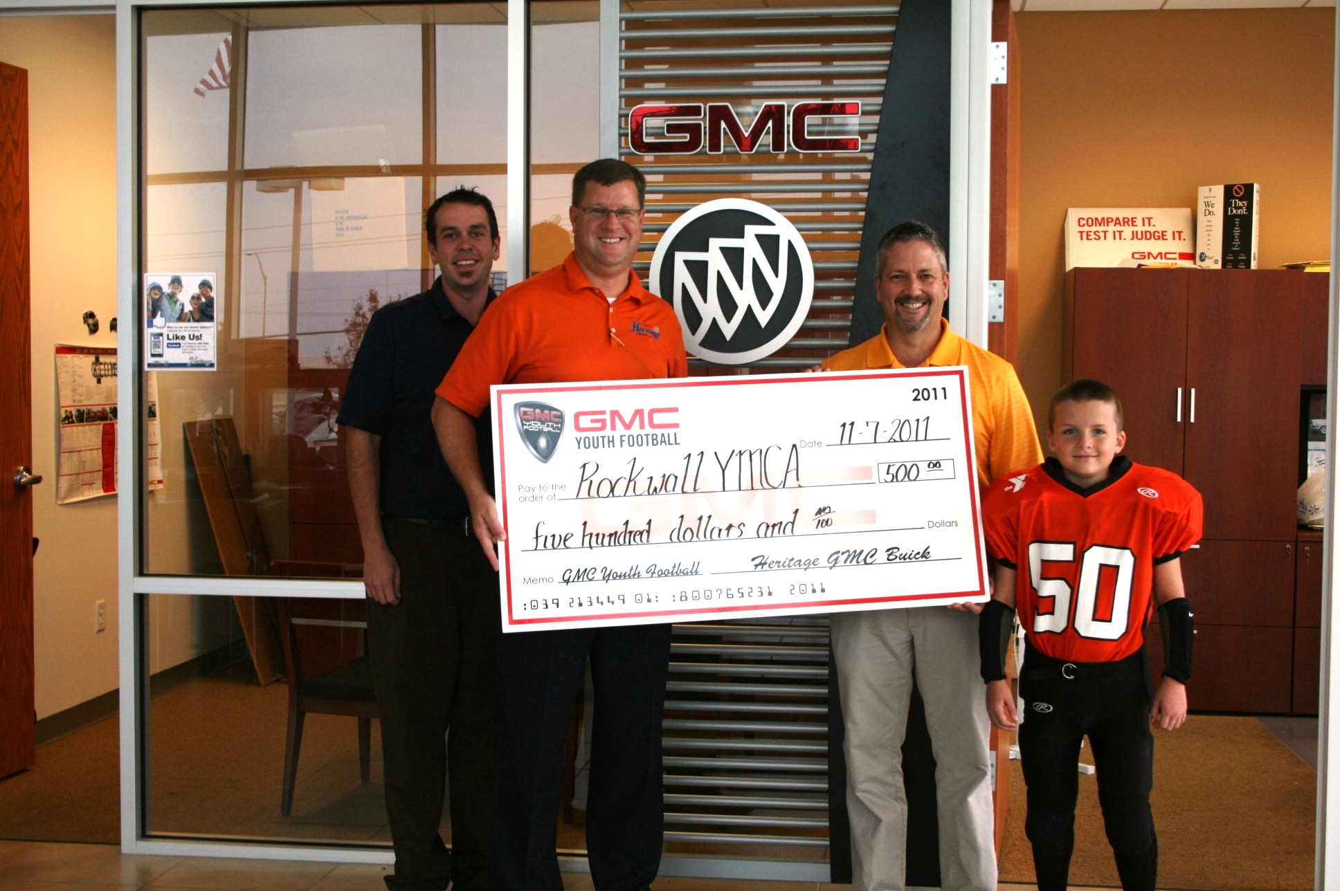 Heritage GMC/Buick donates to YMCA football program