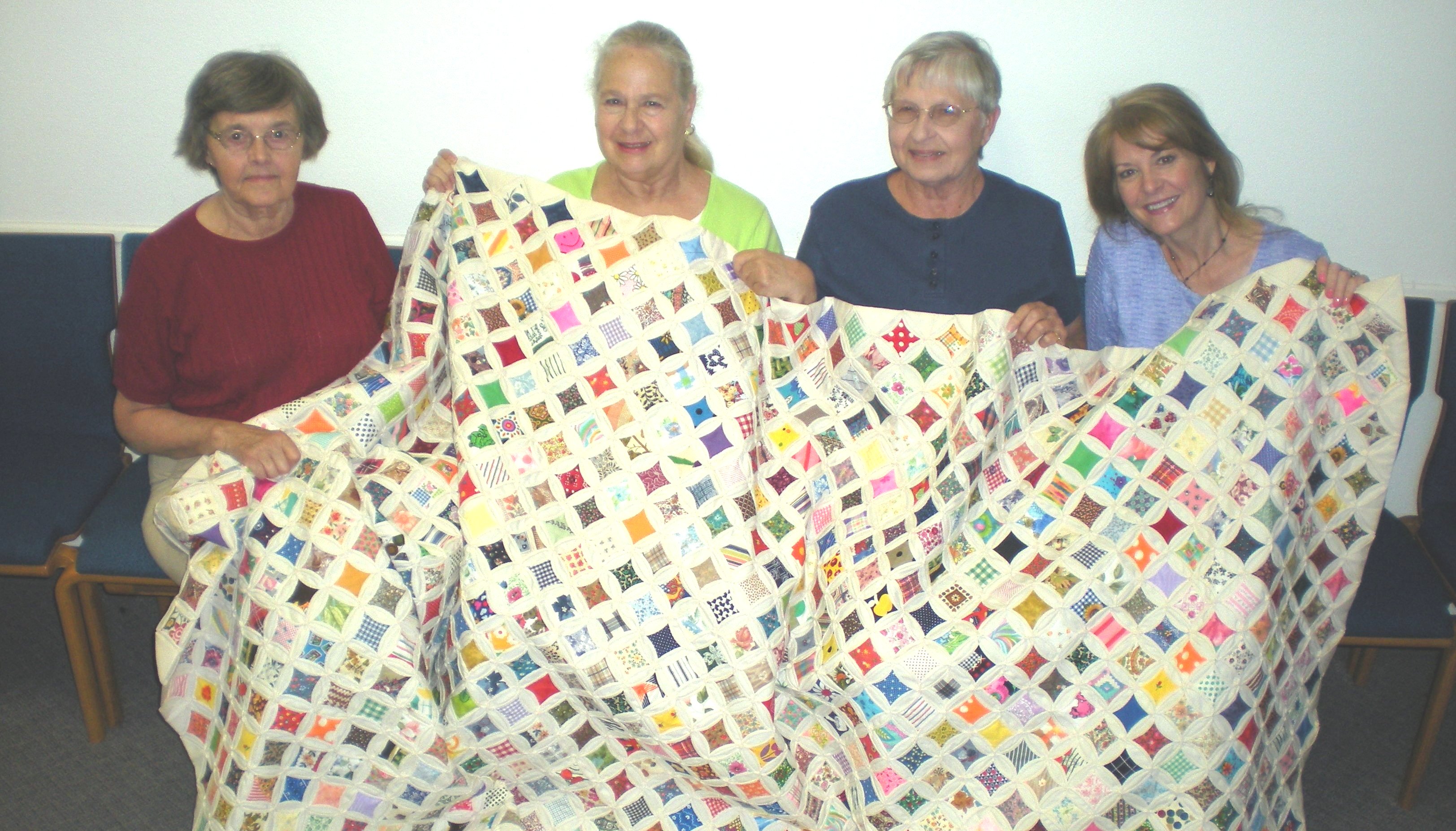 Piecing together memories: Completed quilt brings tears of joy to elderly woman