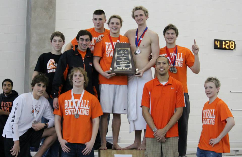 Yellowjackets swim to the top at district championships