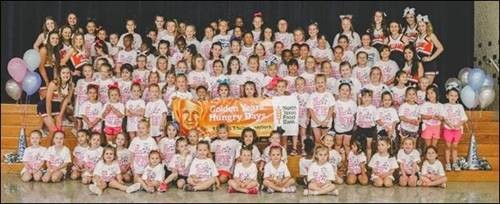 Rockwall Texans, Williams Middle School cheerleaders team up to give back