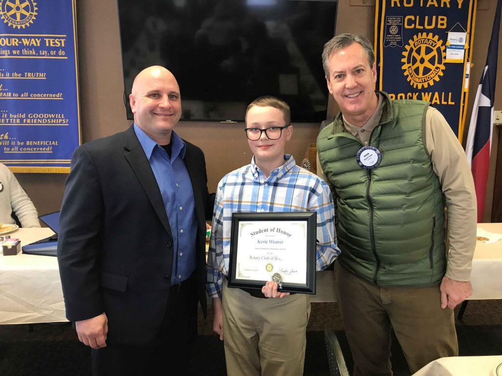 Shannon Elementary Principal Steven Pesek, Rotary Student of Honor Kevie Weaver, and Rotarian Kevin 