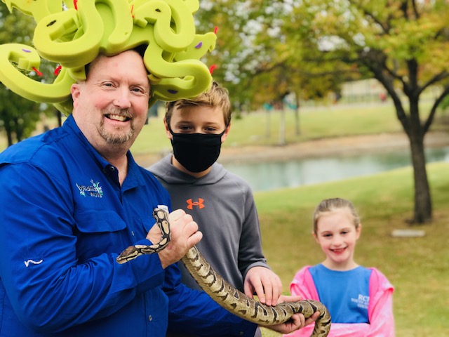 Creepy-crawlies and prehistoric fossils provide thrills at Kids Day in the Park