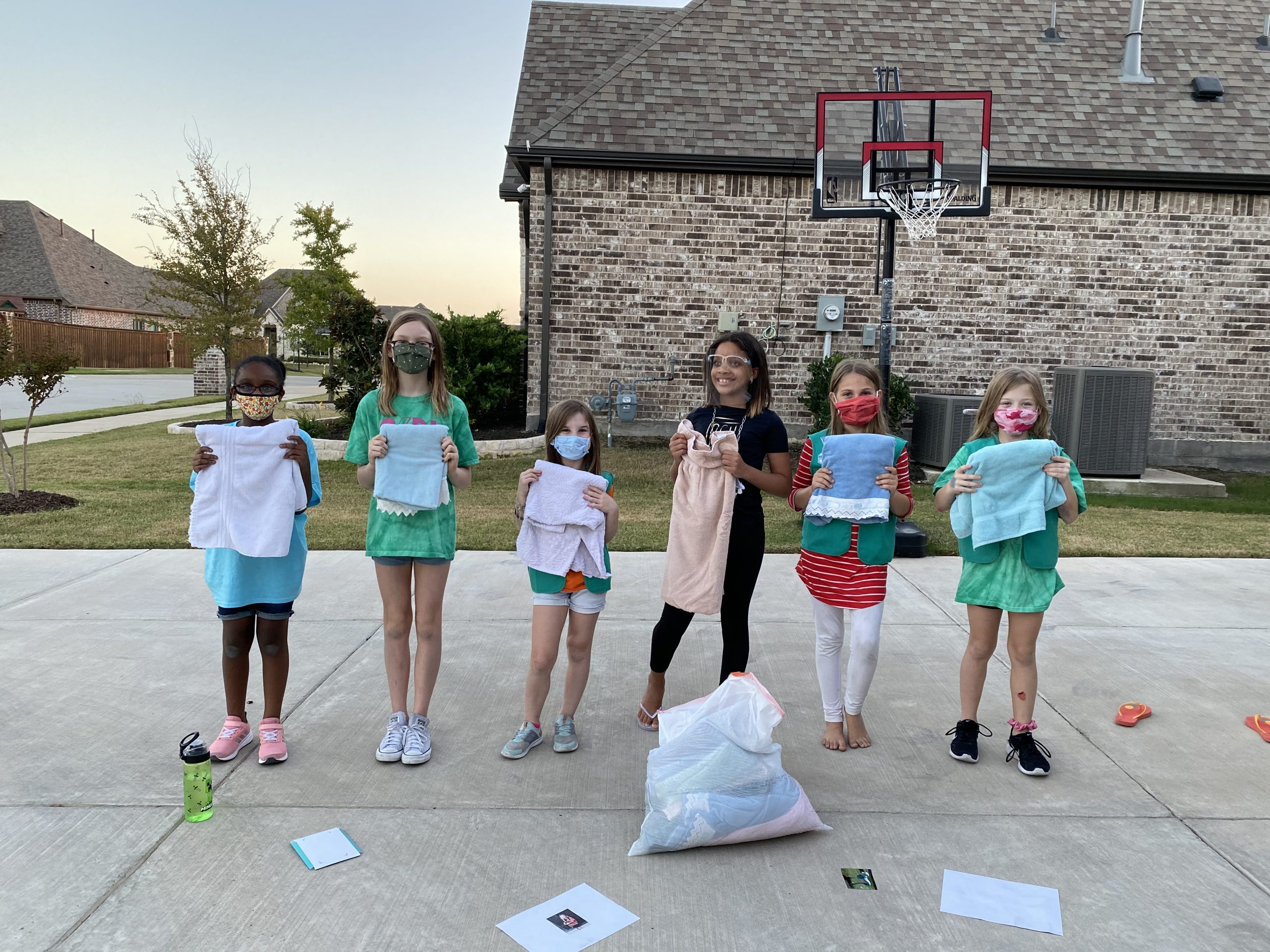 Girl Scout Junior Troop 7618 brings warmth and food to Rockwall Animal