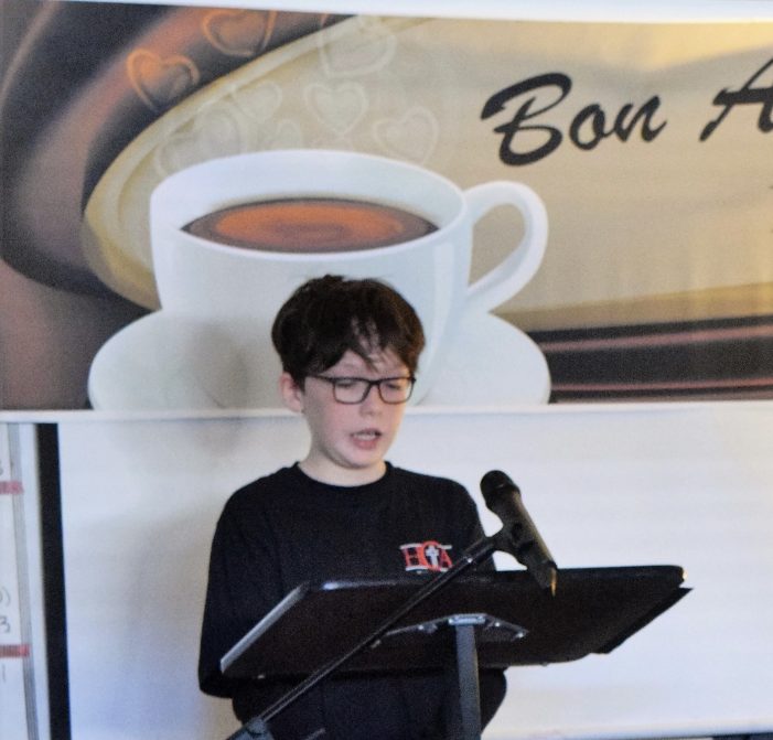 Rockwall student’s poem speaks volumes during Poetry Cafe at Heritage Christian Academy