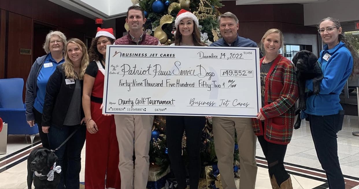 Patriot PAWS receives donation from Business Jet’s annual golf
