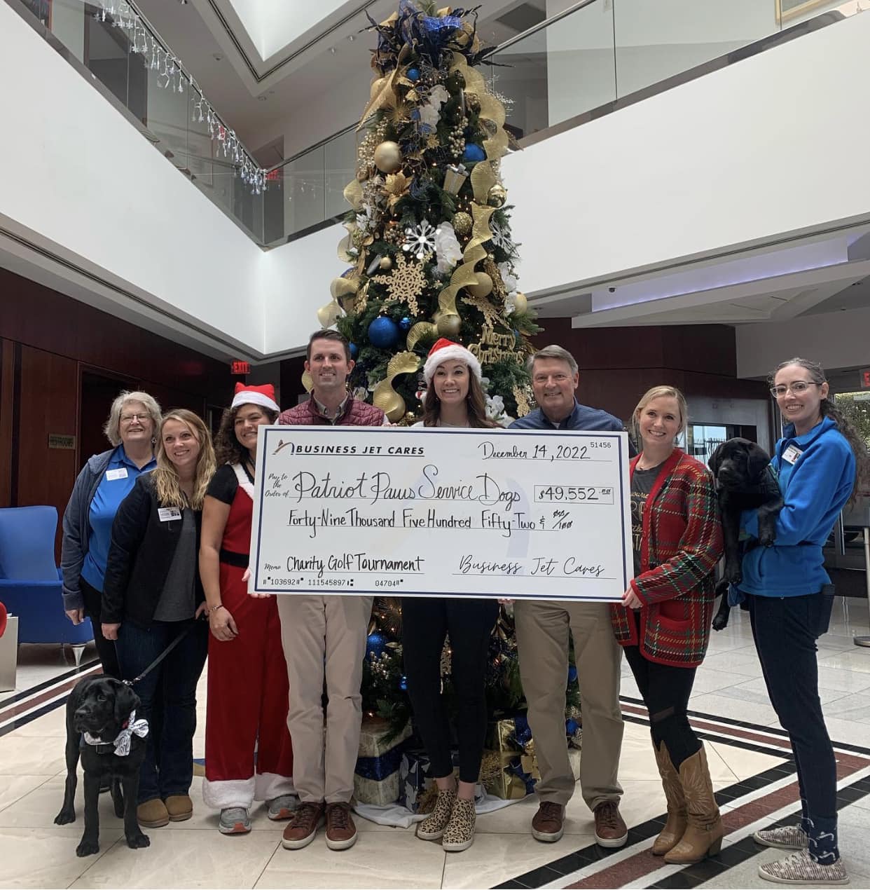 Patriot PAWS receives donation from Business Jet’s annual golf