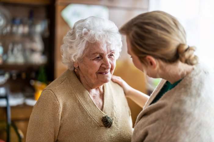 When is the right time for someone with dementia to move into a care home?