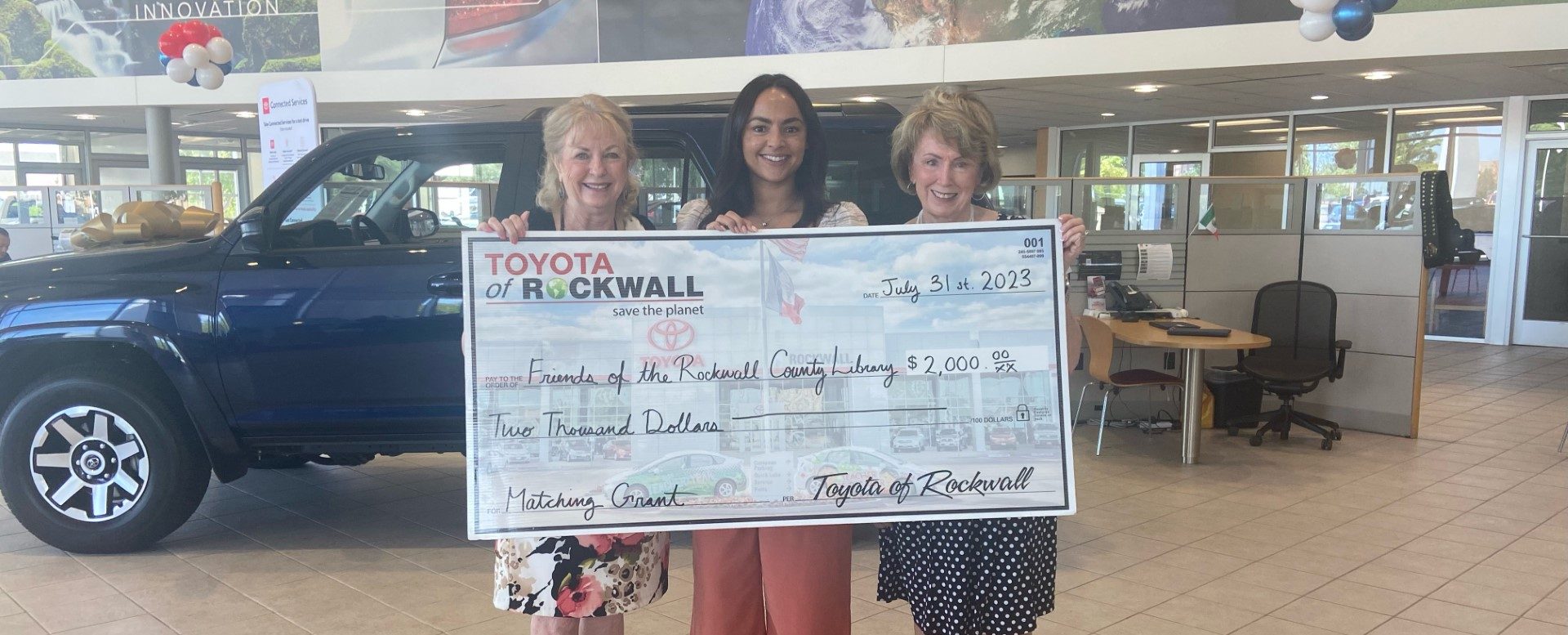 Toyota of Rockwall presents donation to Friends of the Library – Blue ...