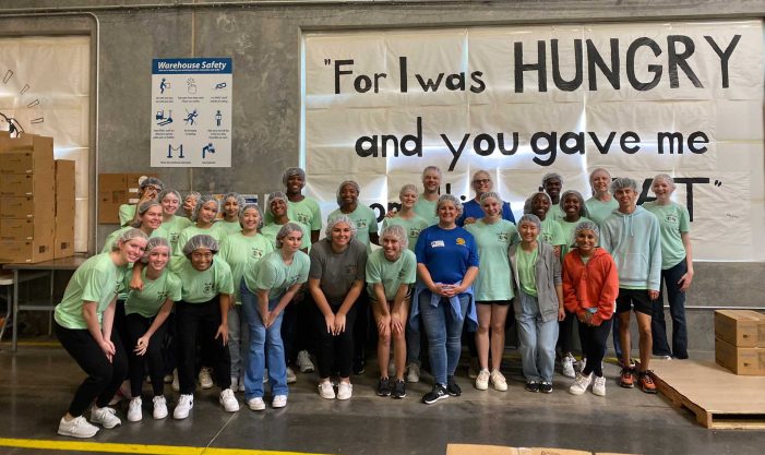 Students from Rockwall High School Interact Club provide community service through Feed My Starving Children