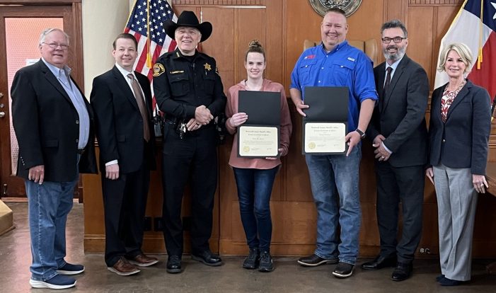 Rockwall County Sheriff presents citizens with Certificates of Merit for assisting at crash scene